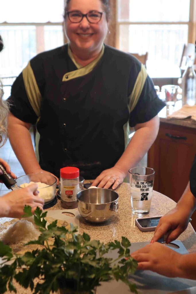 Our Maestra instructs students on making pasta at our Chattanooga cooking school - PastaNooga - Chattanooga's Pasta Making School