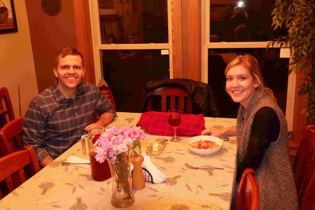 a couple enjoys their creation at PastaNooga's cooking school.